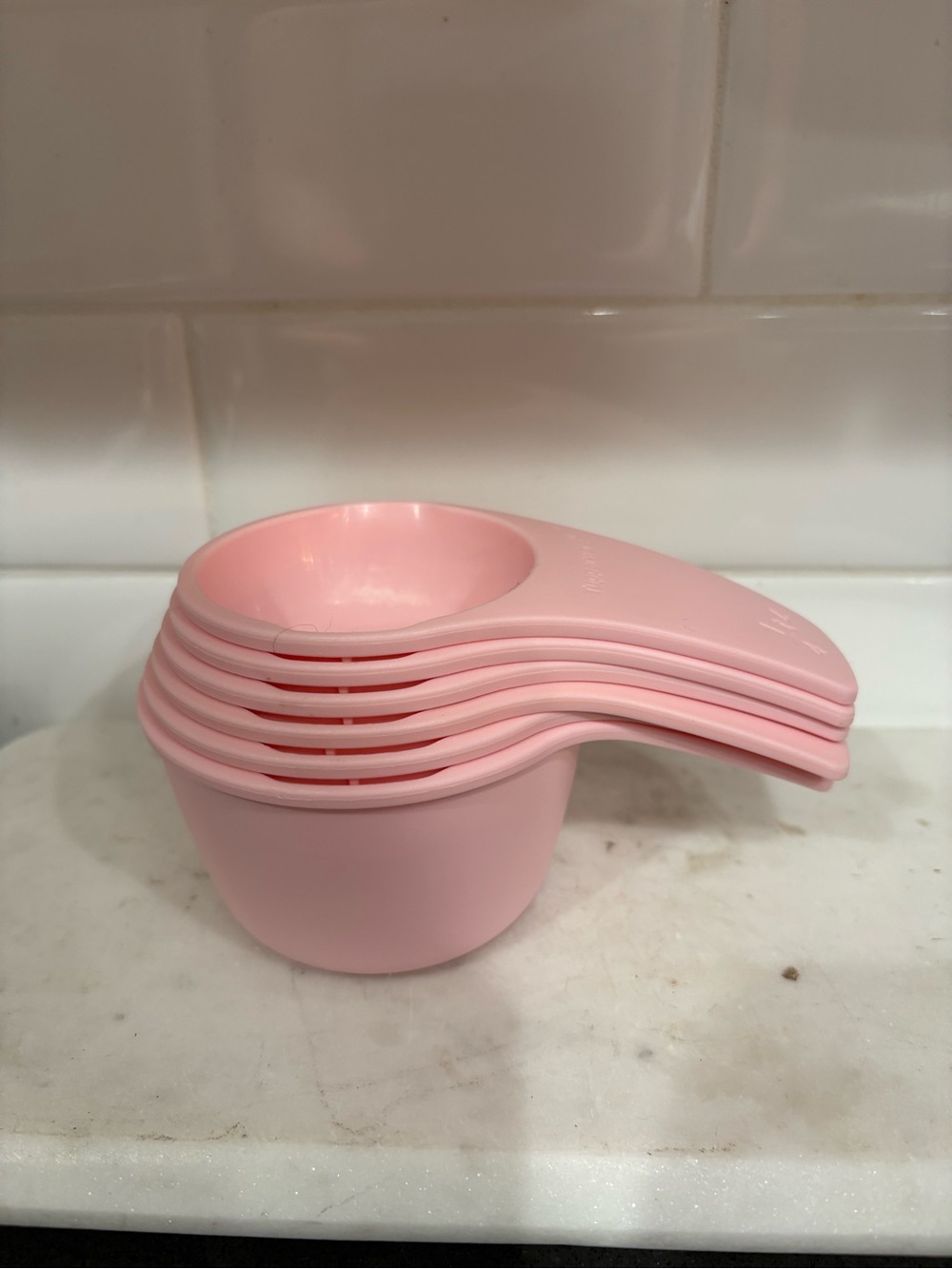 Tupperware Pink Nesting Measuring Cups - Set of 6